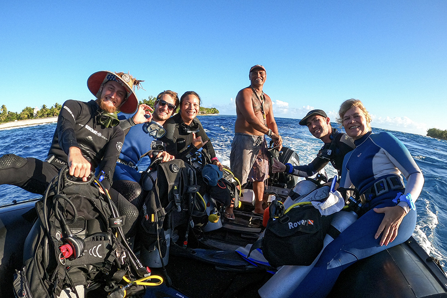 Scuba divers, instructor, and captain